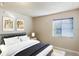 Bedroom with a bed and window with blinds at 275 114Th N Ave # 2, St Petersburg, FL 33716