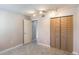 Small bedroom with built in closet at 275 114Th N Ave # 2, St Petersburg, FL 33716