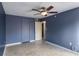 Another bedroom with ceiling fan and tile flooring at 275 114Th N Ave # 2, St Petersburg, FL 33716