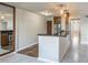 Modern kitchen features stainless steel appliances and a breakfast bar at 275 114Th N Ave # 2, St Petersburg, FL 33716