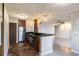 Modern kitchen with dark wood cabinets and granite counters at 275 114Th N Ave # 2, St Petersburg, FL 33716