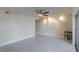 Spacious living room featuring tile floors and ceiling fan at 275 114Th N Ave # 2, St Petersburg, FL 33716