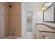 Clean bathroom with shower, tub and granite countertop at 4135 Bell Ave, Sarasota, FL 34231