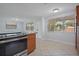 Kitchen with stainless steel appliances and ample cabinet space at 4135 Bell Ave, Sarasota, FL 34231