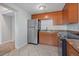 Kitchen with stainless steel appliances and wood cabinets at 4135 Bell Ave, Sarasota, FL 34231
