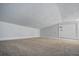 Small loft area with a door for storage at 4135 Bell Ave, Sarasota, FL 34231
