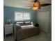 Serene bedroom with a daybed and built in closet at 302 Strasburg Dr, Port Charlotte, FL 33954