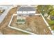 Aerial view showing house, backyard, pool, and fence at 7319 Lagoon Rd, Spring Hill, FL 34606