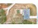 House and backyard aerial view, showing pool and patio at 7319 Lagoon Rd, Spring Hill, FL 34606