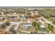 Aerial view of neighborhood with focus on home and backyard at 7319 Lagoon Rd, Spring Hill, FL 34606