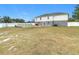 Large backyard with above ground pool and fenced in area at 7319 Lagoon Rd, Spring Hill, FL 34606