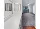 Bright bedroom with grey carpet and access to balcony at 2364 Hanover Dr, Dunedin, FL 34698
