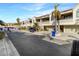 Condo community with street parking and lush landscaping at 2364 Hanover Dr, Dunedin, FL 34698