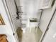 Small laundry room with utility sink and toilet at 2364 Hanover Dr, Dunedin, FL 34698