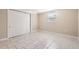 Bedroom with tile floors and mirrored closet doors at 4404 Terry Loop, New Port Richey, FL 34652