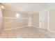 Bright dining area with wood-look wall and tile floors at 4404 Terry Loop, New Port Richey, FL 34652
