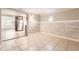 Bright dining area with wood-look wall and tile floors at 4404 Terry Loop, New Port Richey, FL 34652