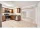 Updated kitchen with stainless steel appliances and wood cabinets at 4404 Terry Loop, New Port Richey, FL 34652