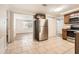Modern kitchen featuring stainless steel appliances and tile floors at 4404 Terry Loop, New Port Richey, FL 34652