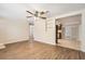 Bright living area with wood-look floors and ceiling fan at 4404 Terry Loop, New Port Richey, FL 34652
