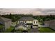 Two-story house with a gray roof, white accents, and a well-maintained lawn at 12211 Streambed Dr, Riverview, FL 33579