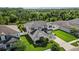 Two-story house with gray roof and white accents, and a large backyard at 12211 Streambed Dr, Riverview, FL 33579