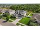 House nestled in a quiet neighborhood with lush green surroundings at 12211 Streambed Dr, Riverview, FL 33579