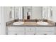 Simple bathroom with double sinks and granite countertop at 12211 Streambed Dr, Riverview, FL 33579