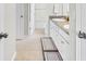 Clean bathroom with double sinks and granite countertop at 12211 Streambed Dr, Riverview, FL 33579