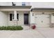 Front view of house with a stone accented porch at 12211 Streambed Dr, Riverview, FL 33579