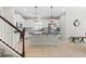 Modern kitchen with large island and pendant lighting at 12211 Streambed Dr, Riverview, FL 33579