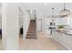 Modern kitchen with island and stainless steel appliances at 12211 Streambed Dr, Riverview, FL 33579