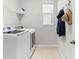 Convenient laundry room with washer and dryer at 12211 Streambed Dr, Riverview, FL 33579