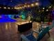 Enjoy your evenings relaxing by the pool with fire pit and comfortable seating at 12211 Streambed Dr, Riverview, FL 33579