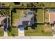 Aerial view of house, pool, and large backyard at 6159 Lenape Ln, North Port, FL 34291