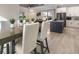 Casual dining area with a view into the kitchen at 6159 Lenape Ln, North Port, FL 34291