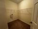 Walk-in closet features carpet flooring and wire shelving at 1570 Fox Grape Loop, Lutz, FL 33558