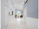 Bright and spacious entryway with tile flooring and views of the living area at 5923 Sandstone Ave, Sarasota, FL 34243