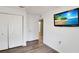 Bedroom showcasing a beach scene TV at 15427 Winter Breeze Ln, Wimauma, FL 33598