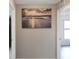 Hallway showcasing a beach picture at 15427 Winter Breeze Ln, Wimauma, FL 33598