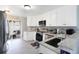Modern kitchen featuring granite counters, stainless steel appliances, and ample lighting at 15427 Winter Breeze Ln, Wimauma, FL 33598