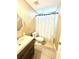 Clean bathroom with a shower/tub combo, toilet, and modern vanity at 6302 Rosefinch Ct # 104, Lakewood Ranch, FL 34202