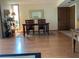 Simple dining area, featuring a traditional style wooden table with seating for four at 1322 Pelican Creek Xing # B, St Petersburg, FL 33707