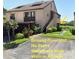 Charming two-story home features a ground floor unit, waterfront view, and direct access at 1322 Pelican Creek Xing # B, St Petersburg, FL 33707