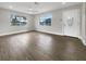 Spacious living room featuring wood-look floors and lots of natural light at 4642 Spahn St, Sarasota, FL 34232
