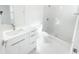 Modern bathroom featuring a white vanity, sleek sink, and glass shower at 37 Warrington Blvd, Port Charlotte, FL 33954