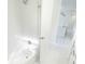 A clean and modern bathroom showcasing a tiled shower with glass door, vanity, and marble tile flooring at 37 Warrington Blvd, Port Charlotte, FL 33954