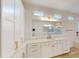 Stylish bathroom with double vanity, quartz counters, and modern fixtures, offering a spa-like experience at 14036 Prairie Hill Rd, Dade City, FL 33525