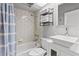 Bright bathroom featuring a shower/tub combo and square sink, offering functionality and style at 505 Sally Lee Dr, Ellenton, FL 34222