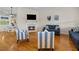Inviting living room with fireplace, comfortable seating, and decor, creating a perfect space to relax at 505 Sally Lee Dr, Ellenton, FL 34222